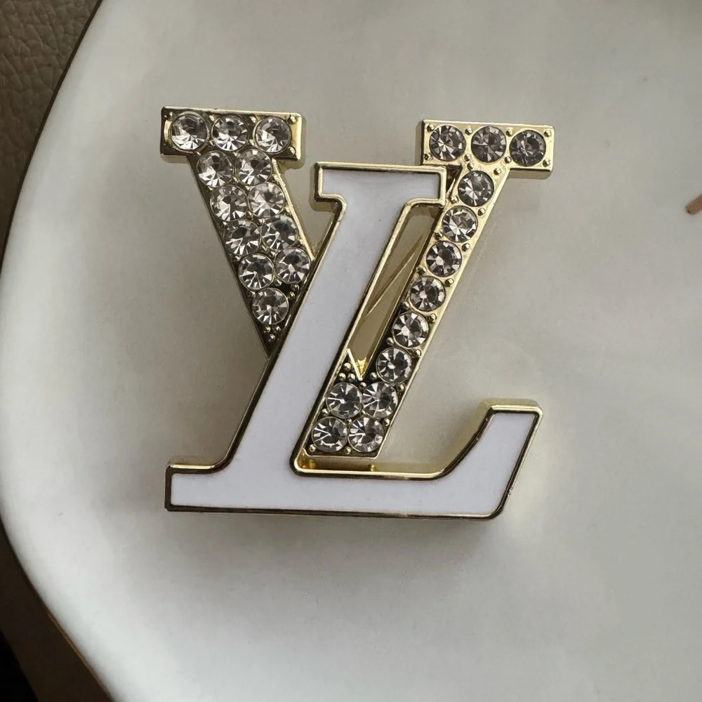 Gold and White Crystal Logo Brooch- - Picture 1 of 2